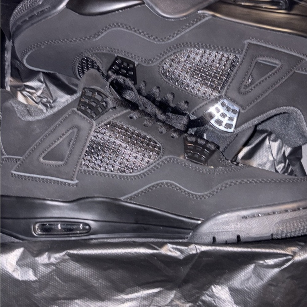 Jordan Air 4 Retro Black and Graphite Sneakers